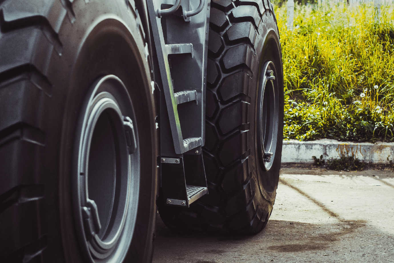 Closeup of car tires on the road. Tractor tire.<br />
